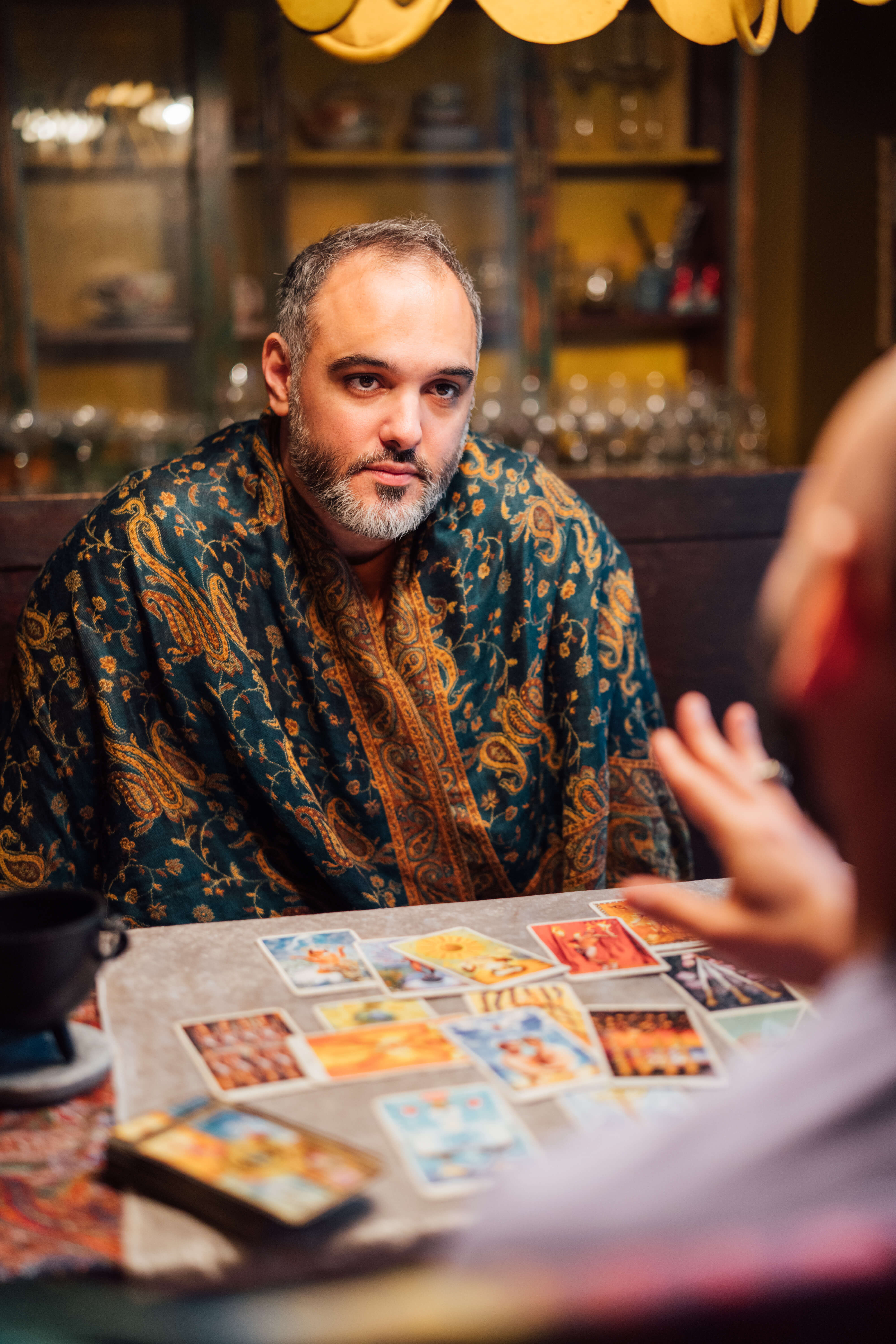 Tarot reader at the table